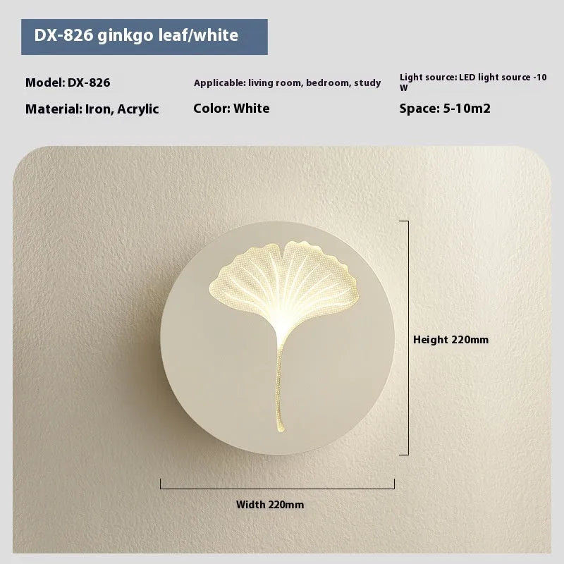 Modern bedside lamp with an acrylic shade showing a love heart motif and three-colour LED light.