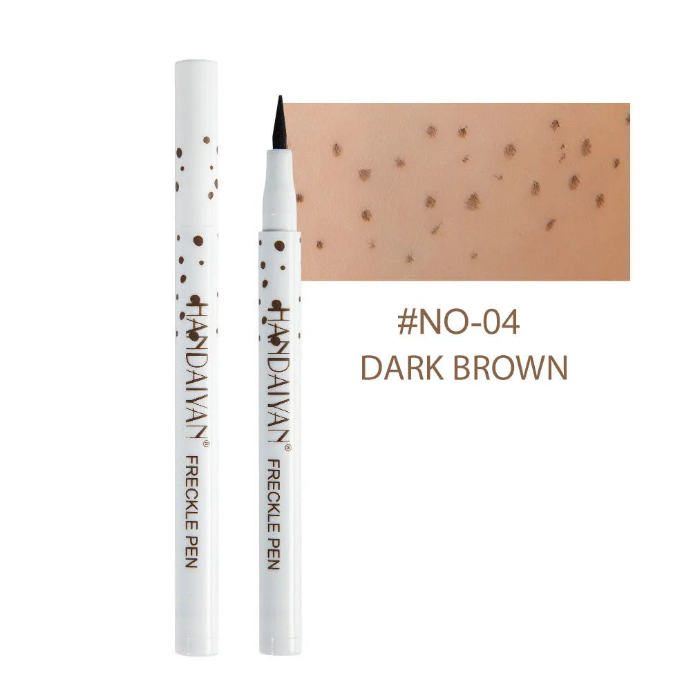 Dark brown cosmetic freckle pen with precision tip for waterproof face and body makeup.