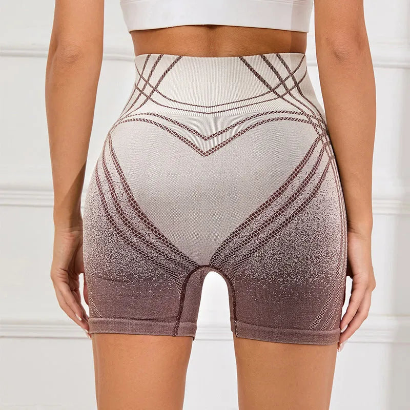 Women's gradient high waisted fitness shorts in nylon blend fabric available in brown and black colours