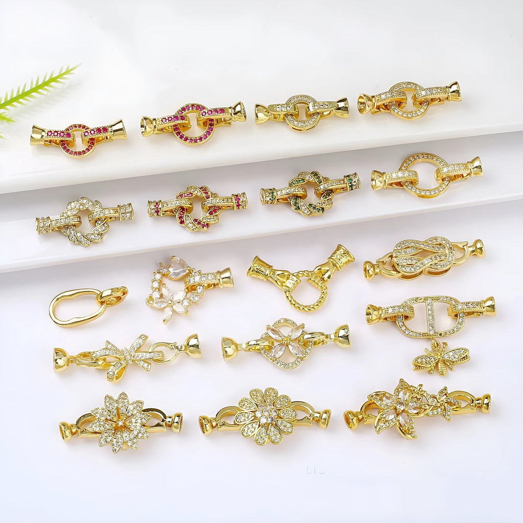 Small gold-coloured metal necklace clasp with a chain buckle for DIY jewellery making.