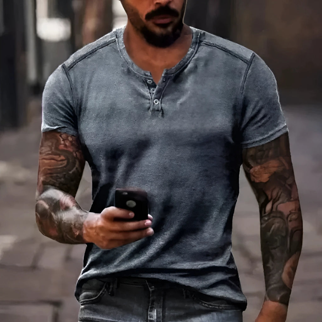 Men's blue polyester short sleeve sports shirt with a button lapel, laid flat.
