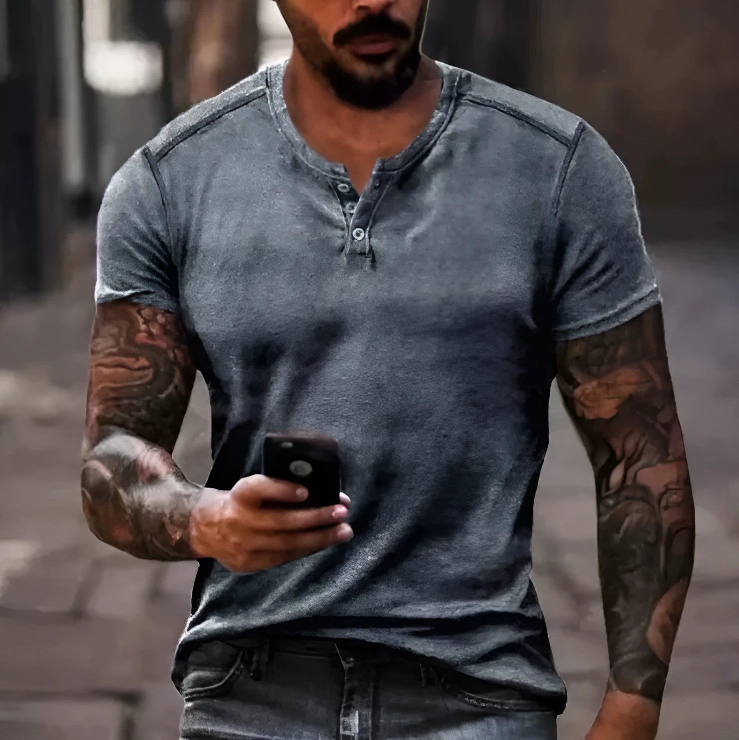 Men's blue polyester short sleeve sports shirt with a button lapel, laid flat.