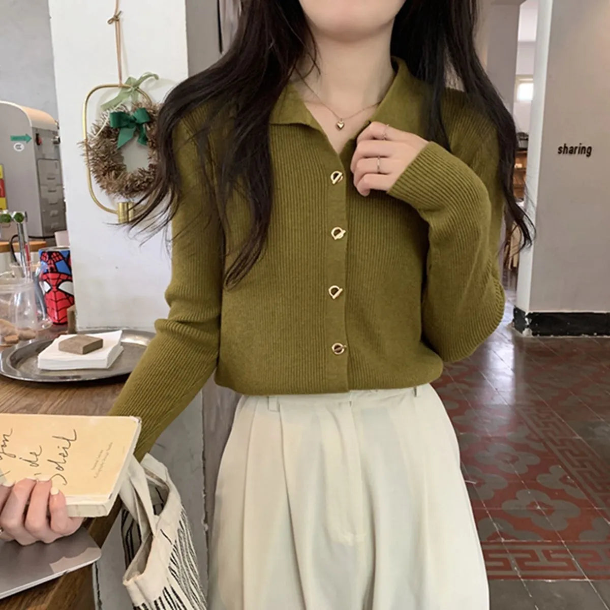 Women's loose-fit long sleeve knitted cardigan in viscose, shown in beige colour.