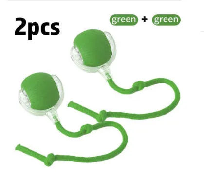 Silicone rolling ball cat toy in red, green, or grey colours, some variants with an attached rope.