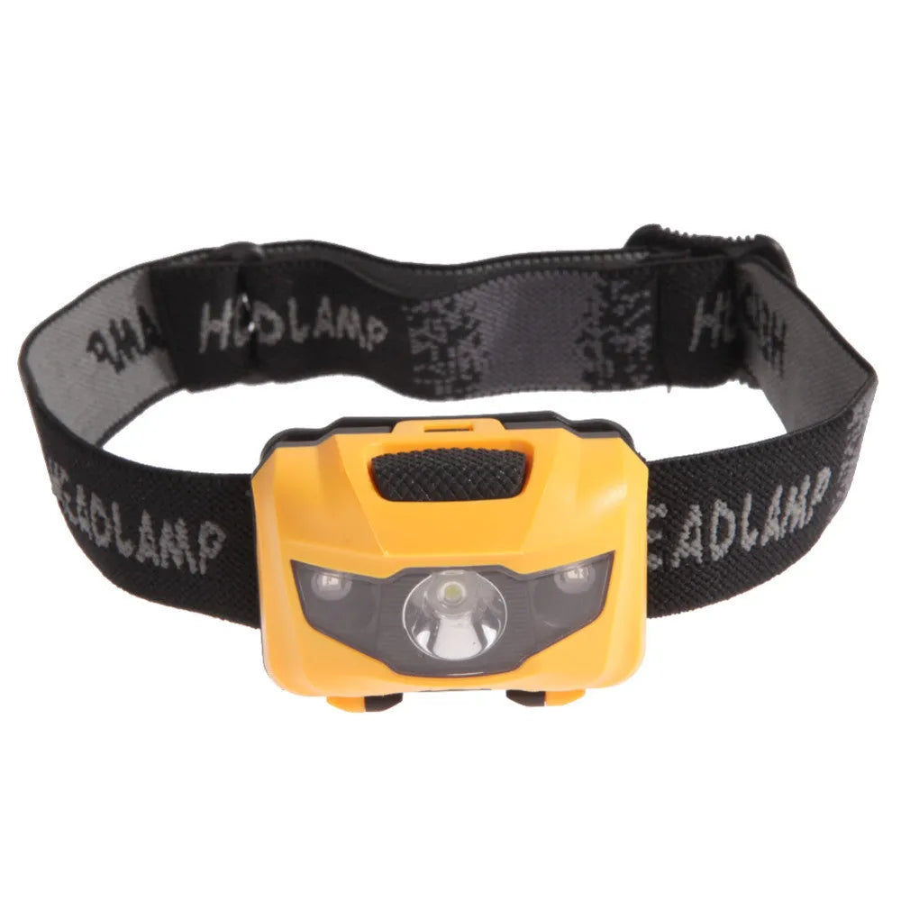 Black LED head torch with adjustable strap, showing white and red LEDs, for outdoor activities.