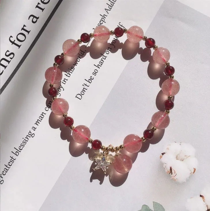Handmade strawberry quartz crystal bracelet with hetian jade peach blossom elements in five style variations