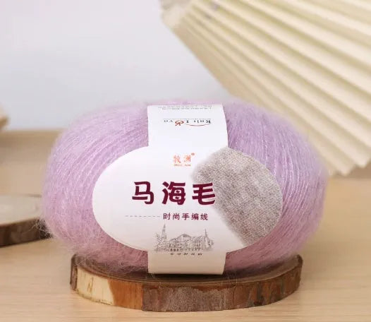 Mohair wool ball for DIY scarf knitting in assorted colours on white background