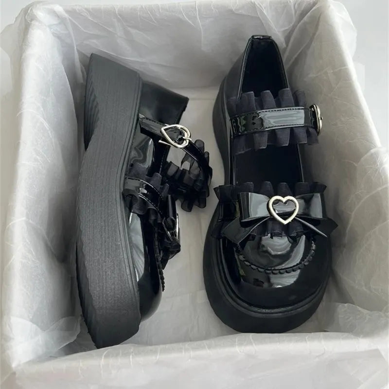 Mary Jane platform shoes for women with wedge heel on a plain background