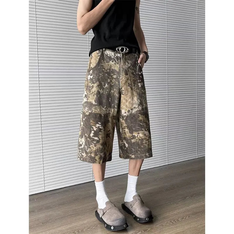 Yellow snake pattern camouflage cotton denim jeans with cropped length and distressed detailing