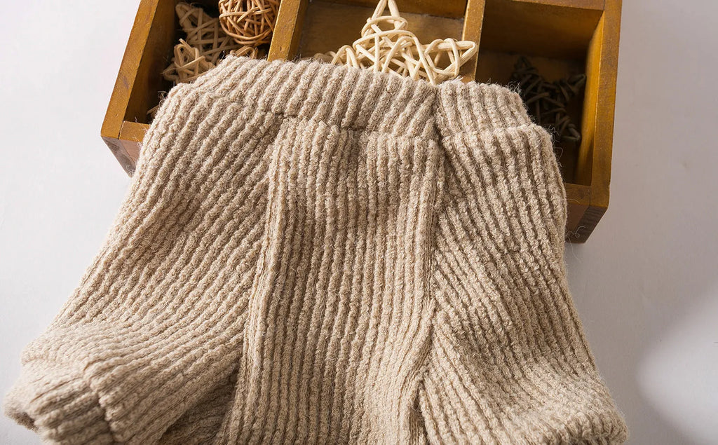 Brown casual cloth sweater for a small dog on a mannequin, showing size range XS to XL.