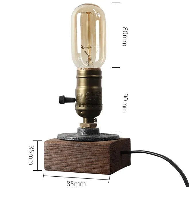 Industrial water pipe table lamp with wood and iron construction on tabletop