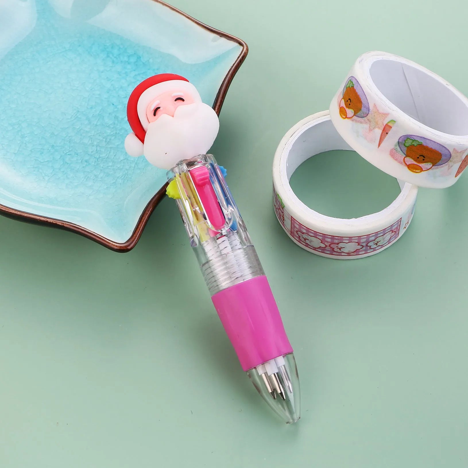 Compact 11cm Christmas four-colour ballpoint pen with press mechanism in festive designs