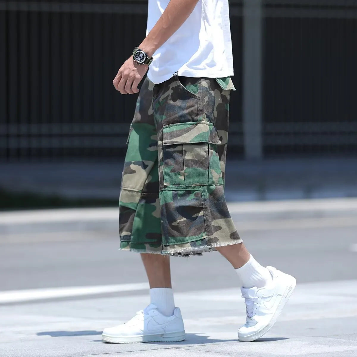 Men's camouflage pattern shorts with retro workwear styling and loose cropped fit
