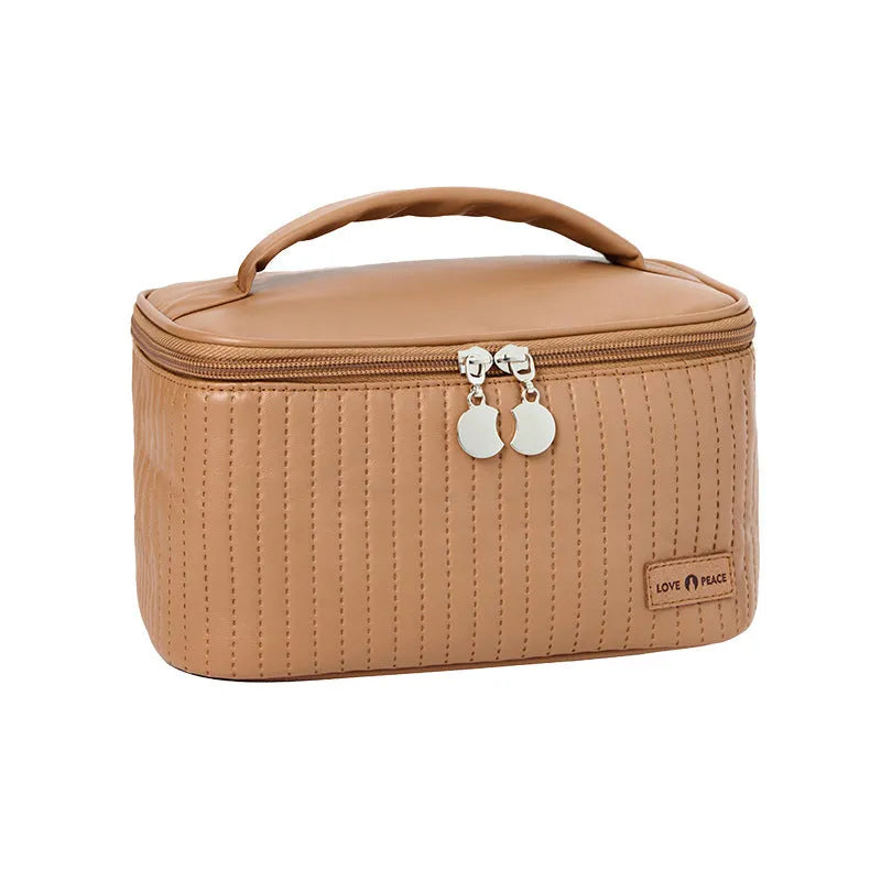 Open-top PU leather makeup bag in a choice of six solid colours including pink, coffee, and light blue.