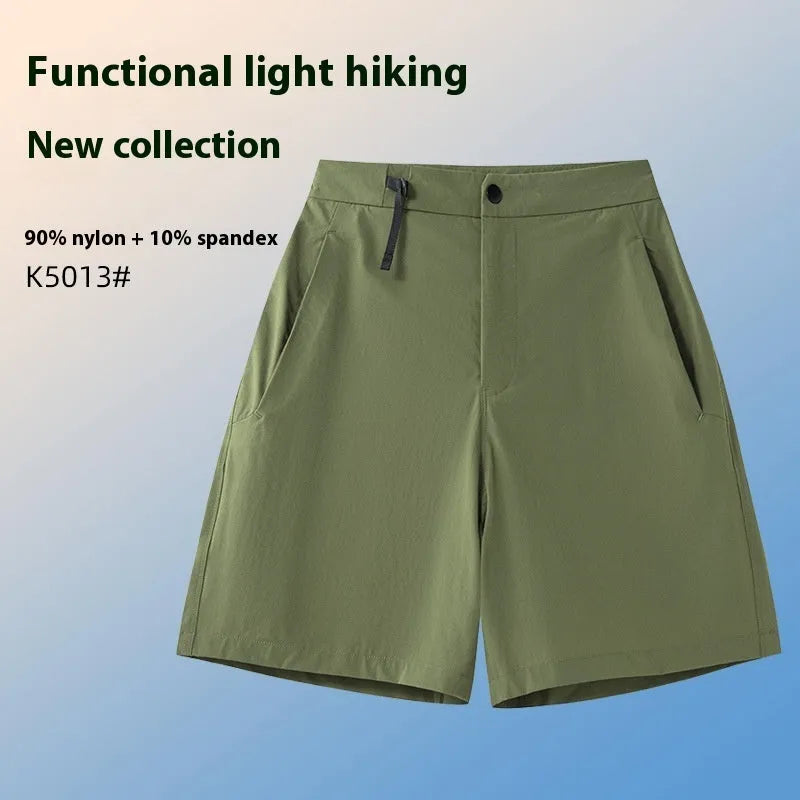 Men's solid colour quick-dry sports shorts with elastic waistband, shown in khaki.