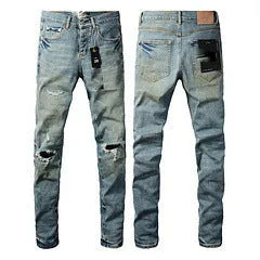 A pair of black slim fit skinny jeans with a straight leg and button fly closure on a mannequin.