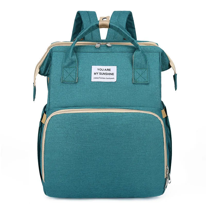 Portable folding mummy bag in multiple colours with curved shoulder strap and USB interface