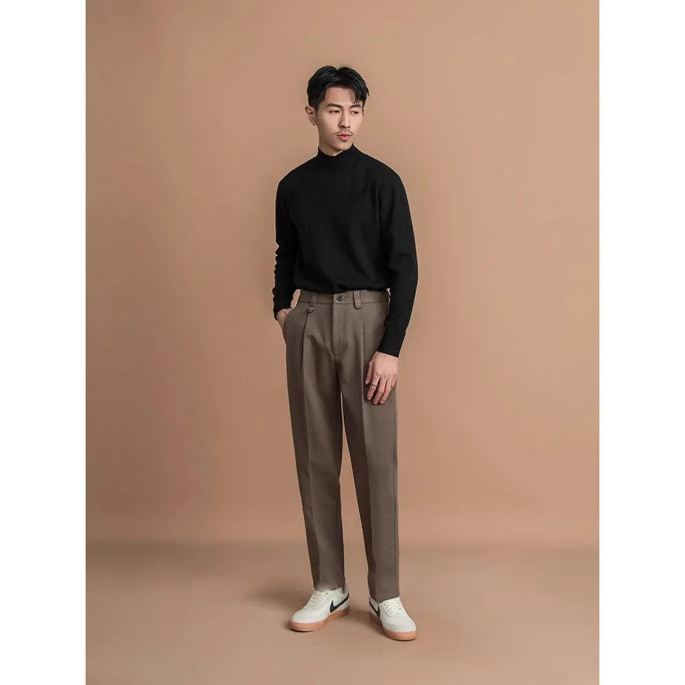 Man wearing straight-leg black polyester suit pants for business casual attire