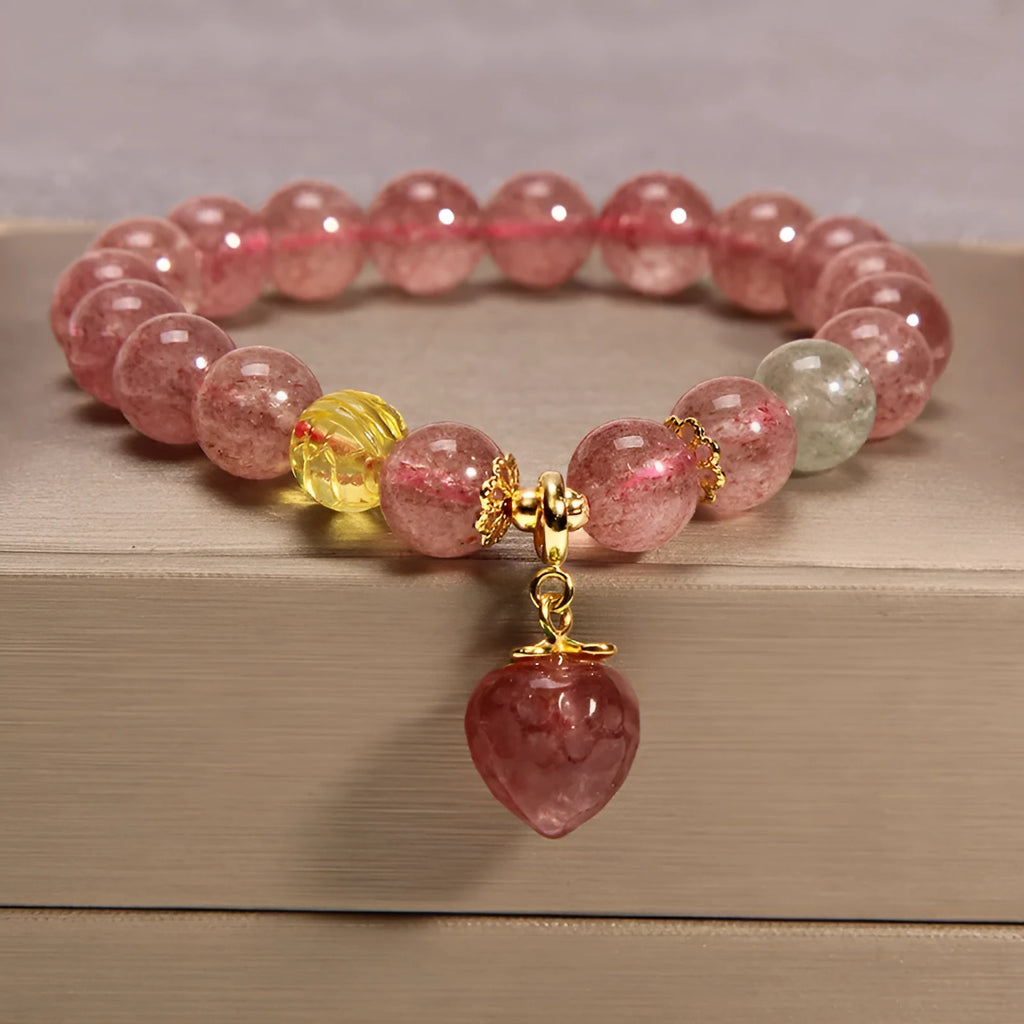 Women's multi-layer crystal bracelet with natural garnet, strawberry quartz, and moonstone pendants in Korean style.