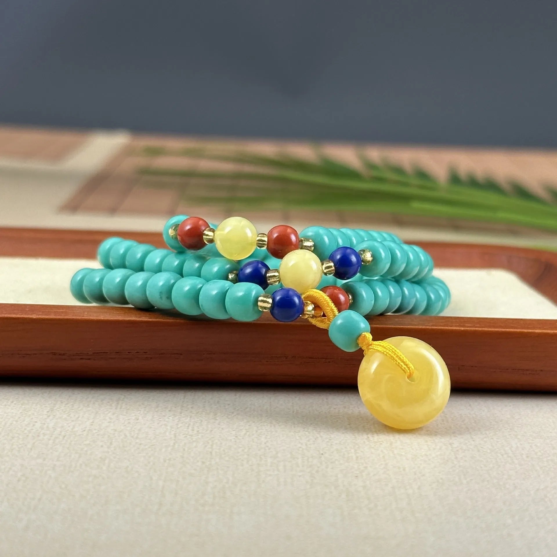 Hand-woven turquoise mesh flower lucky pendant necklace on ball bead chain