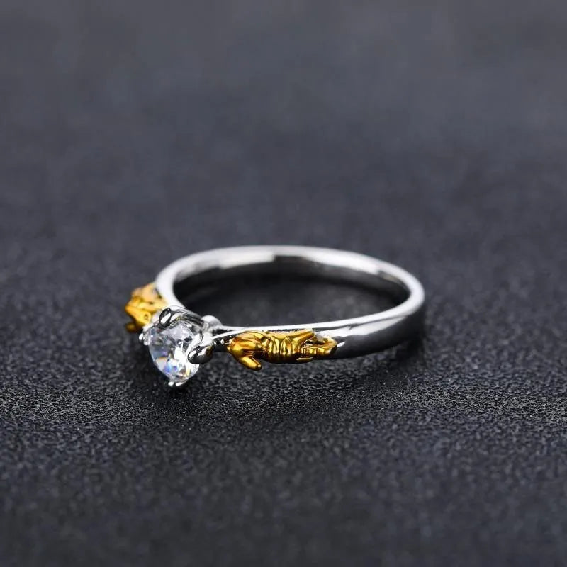Crown-shaped copper cosplay ring with black gold finish and crystal detail.