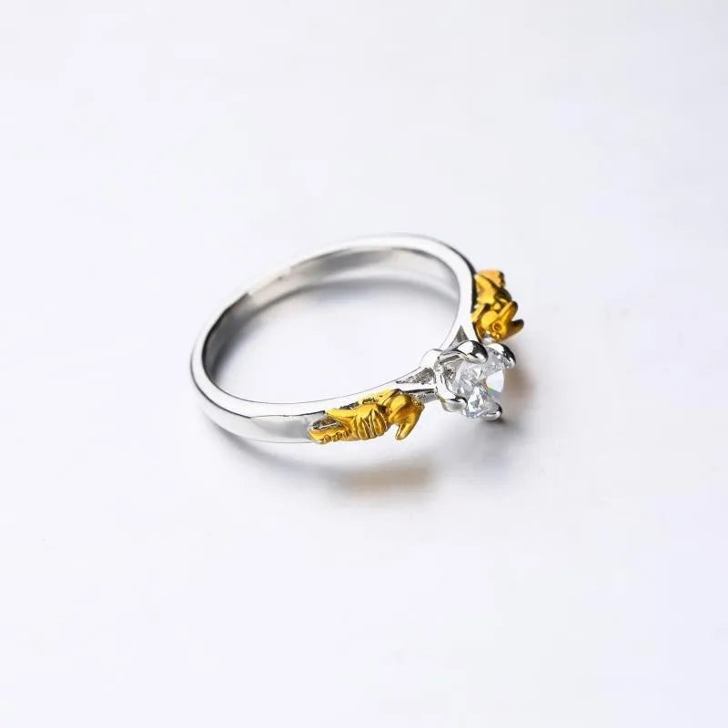 Crown-shaped copper cosplay ring with black gold finish and crystal detail.