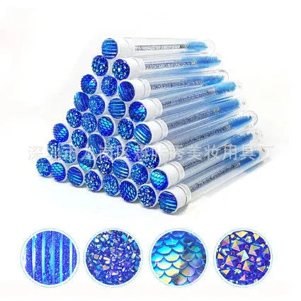 Set of coloured disposable eyelash spoolie brushes inside clear plastic storage tubes.