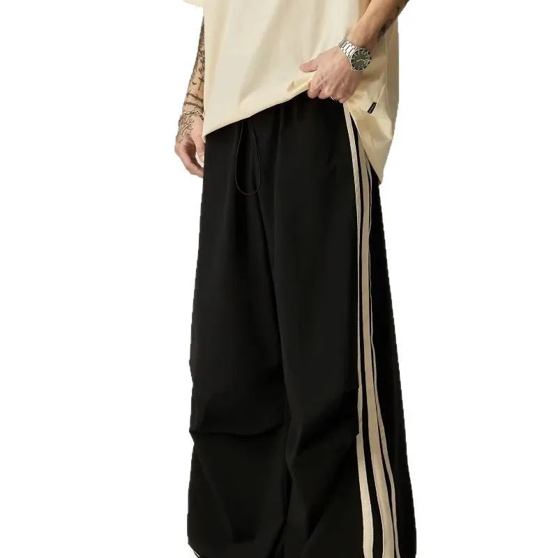 Men's black wide-leg climbing trousers with high waist and straight-leg design