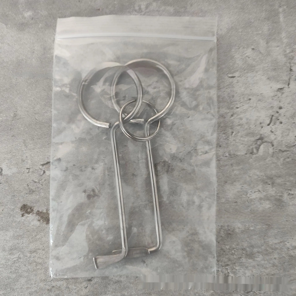 Two alloy steel wrench tools from a portable universal tool set for household and mechanical use