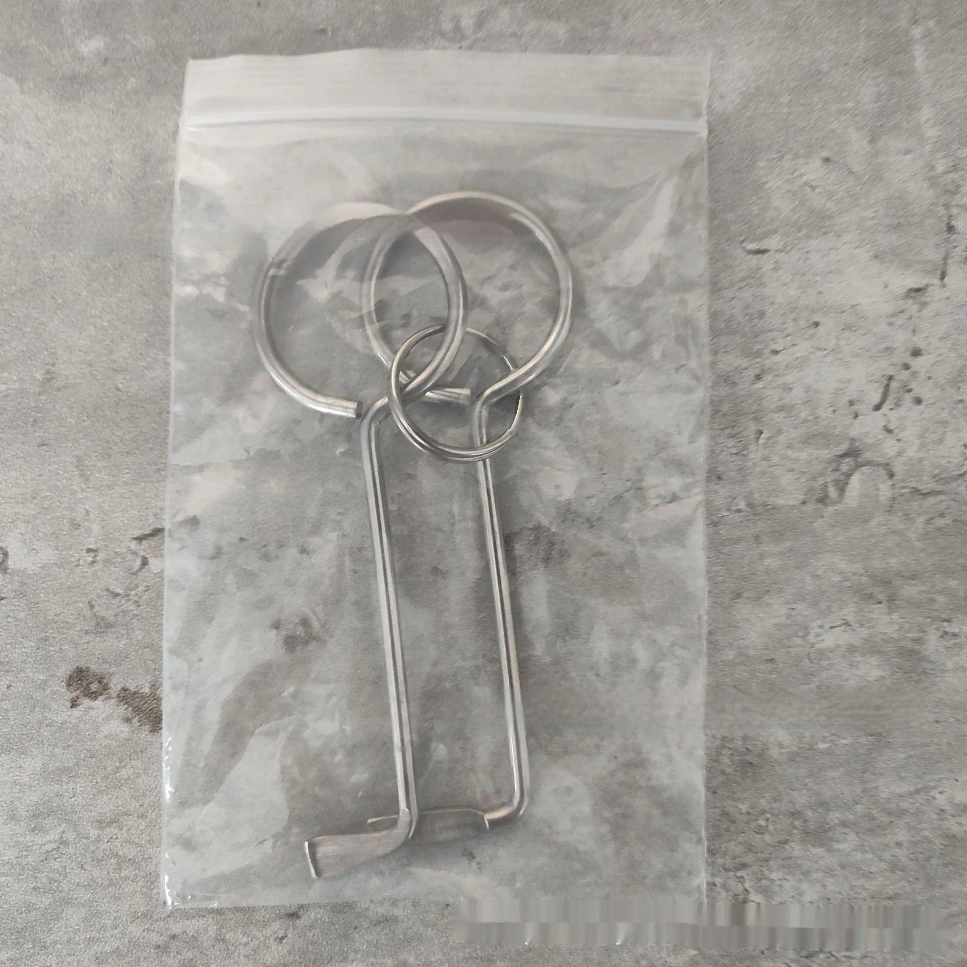 Two alloy steel wrench tools from a portable universal tool set for household and mechanical use