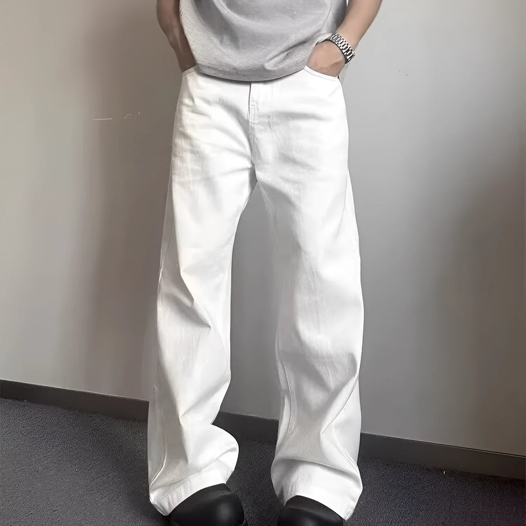 Men's white loose straight-leg cotton denim jeans with wide cut and zipper fly
