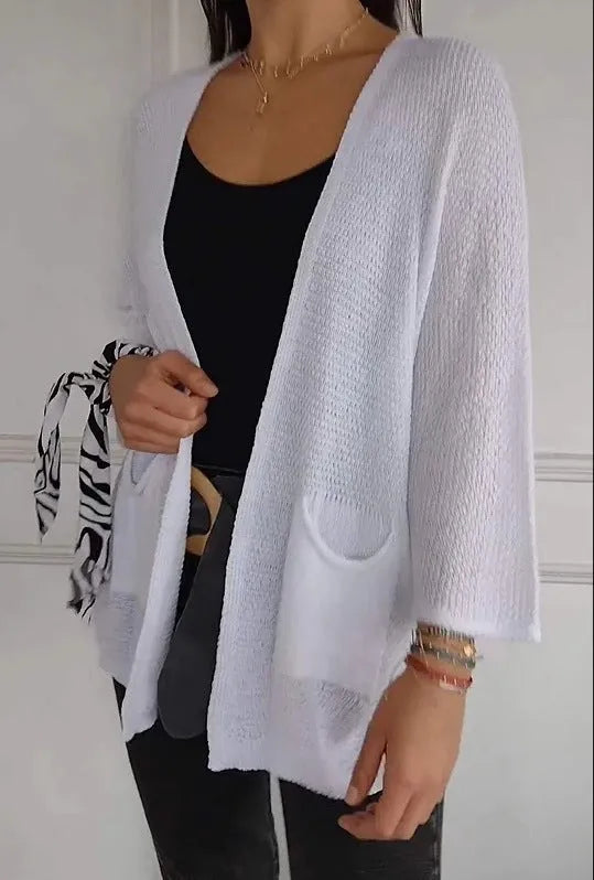 Women's thin waffle weave cardigan coat in army green with nine-quarter sleeves and pockets.