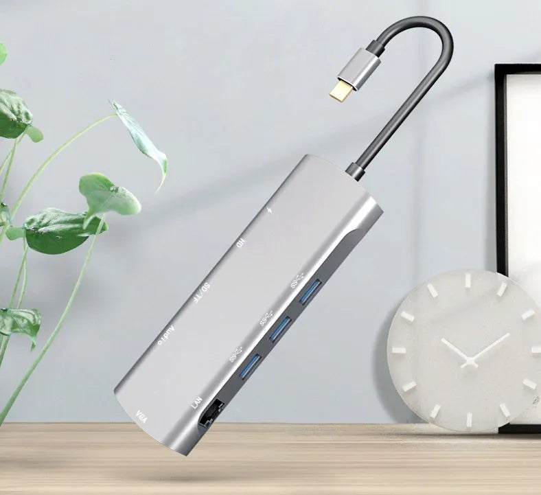 Grey USB-C docking station with aluminium alloy shell and multiple connectivity ports