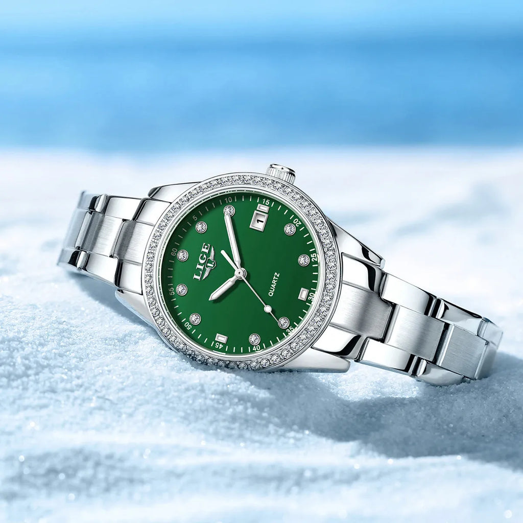 Silver fashion watch with diamond dial, luminous hands, and stainless steel case.