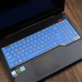 Clear protective keyboard film cover for ASUS Flight 14-inch laptop on a keyboard.