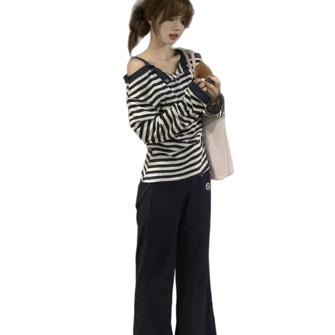 Dark blue Korean-style oversized women's long-sleeved T-shirt with embroidery, stripes, and button details on a soft viscose fabric.