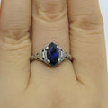 Silver women's geometric hollow ring with zircon detailing on finger