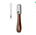 Short red leather and metal iPhone lightning charging cable showing 20cm length.