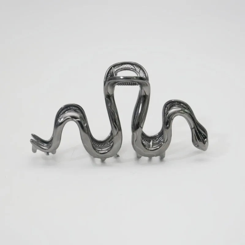 Silver metal hair clip with Slytherin serpentine snake design measuring 10.5 cm