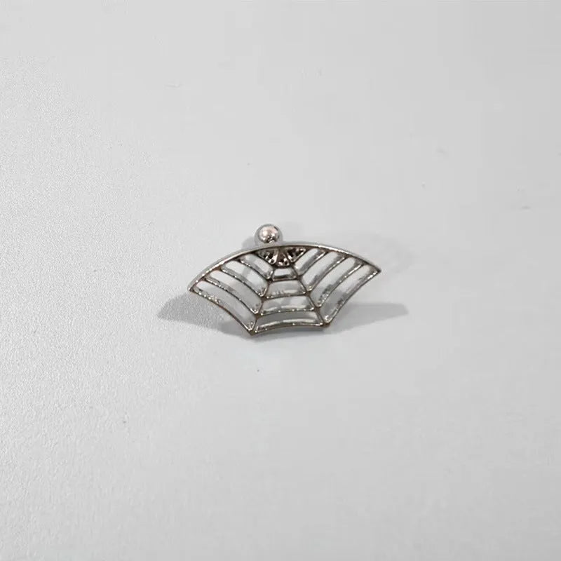 Spider web pattern stud earrings in electroplated gold and silver metal finishes