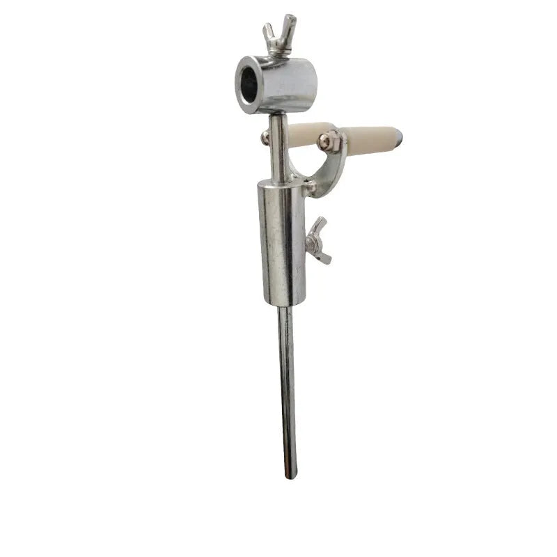 Metal wheel brow scriber depression repair tool on a workbench with a car body panel