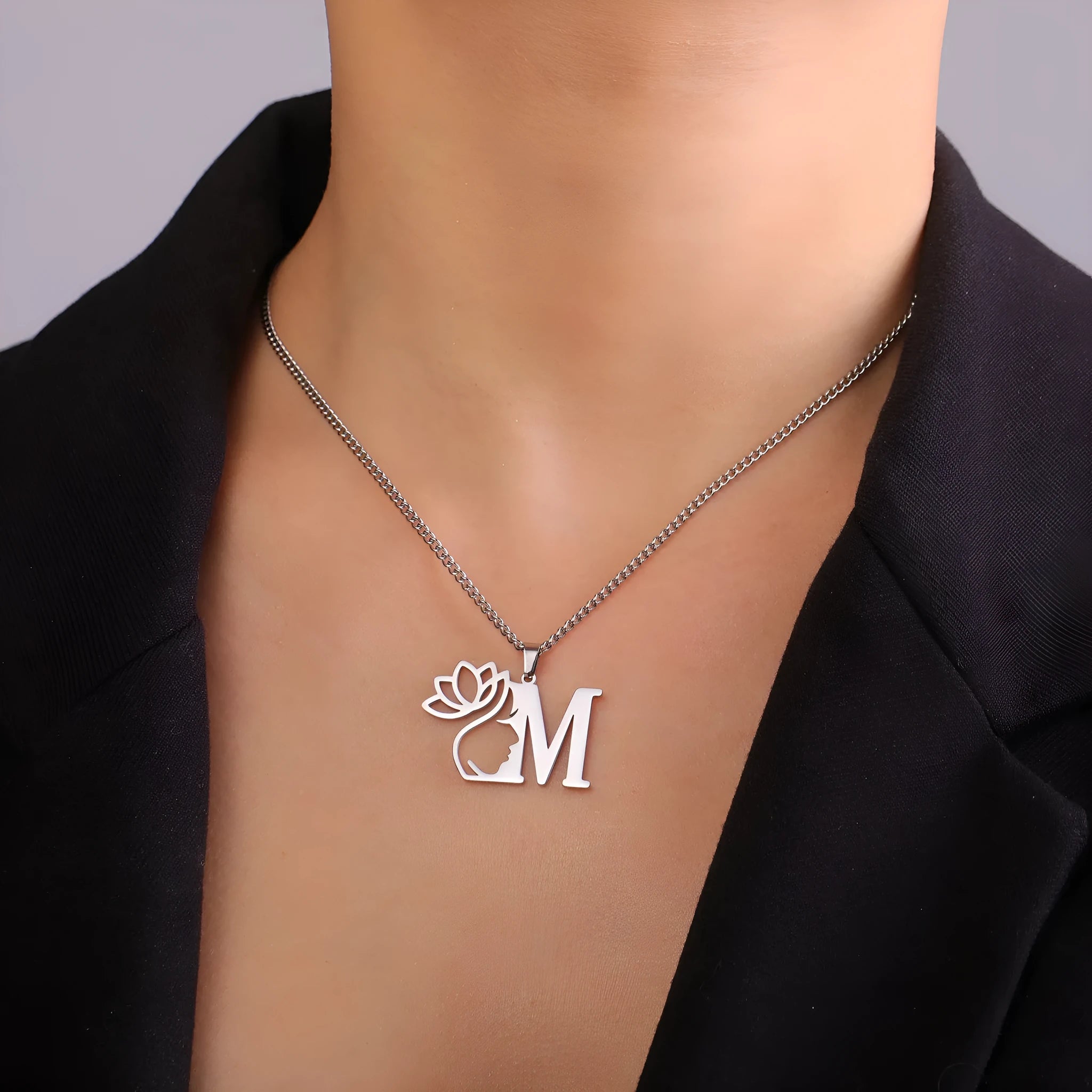 Stainless steel cross chain necklace with electroplated finish shown in gold and silver colour options