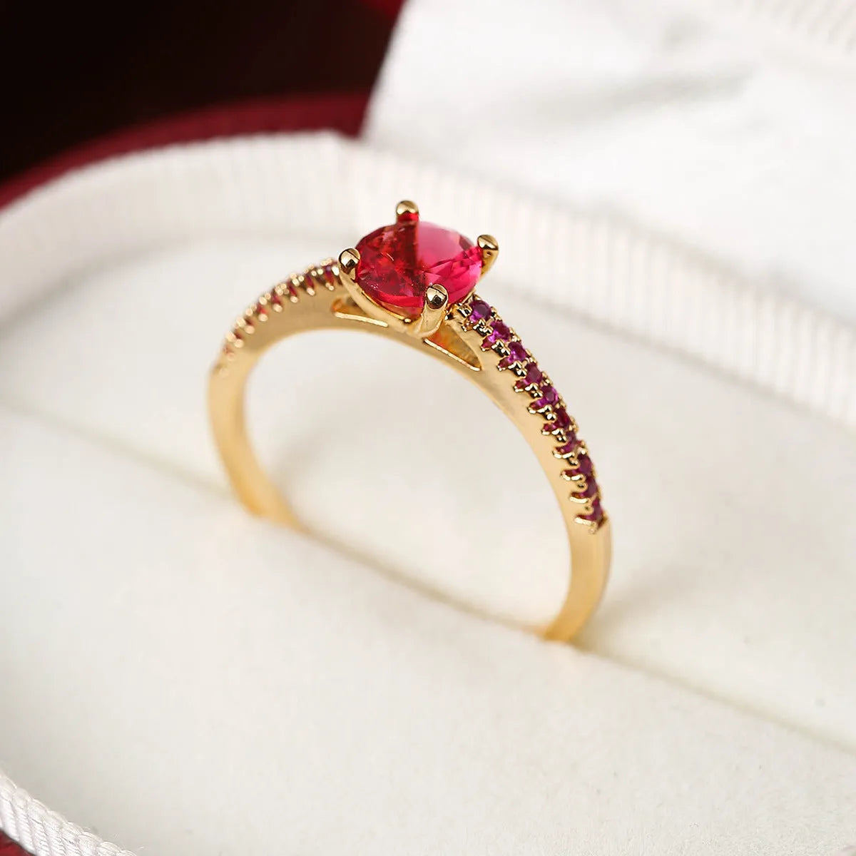 Geometric hexagon copper ring with electroplated finish in gold rose red colour on hand