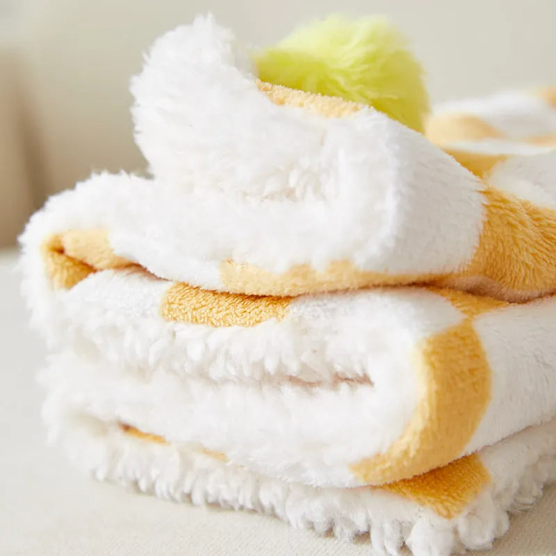 Plaid pattern pet blanket with fur ball decorations in green, pink or yellow colours