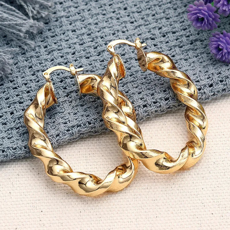 Copper geometric ring design ear clip earrings for women in assorted colours.