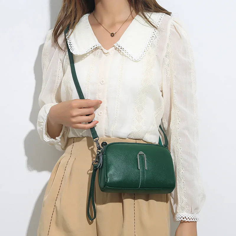 Women's genuine leather square shoulder bag in dark khaki colour, showing structured horizontal shape.