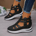 Women's black close-toed hollow-out platform sandals with Velcro strap on a white background