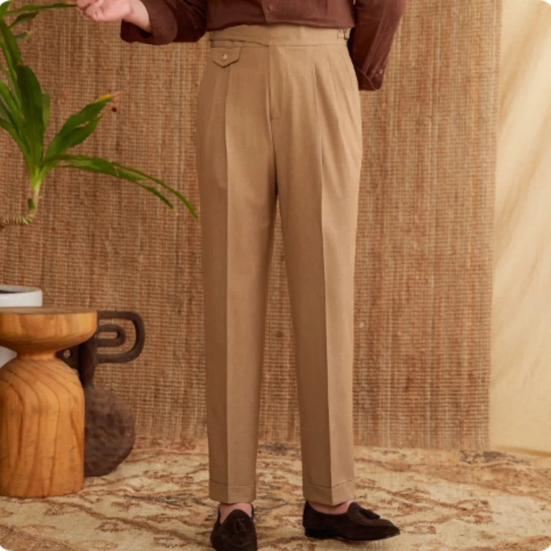 Men's slim fit straight leg business trousers in light brown colour, showing wrinkle resistant polyester fabric.