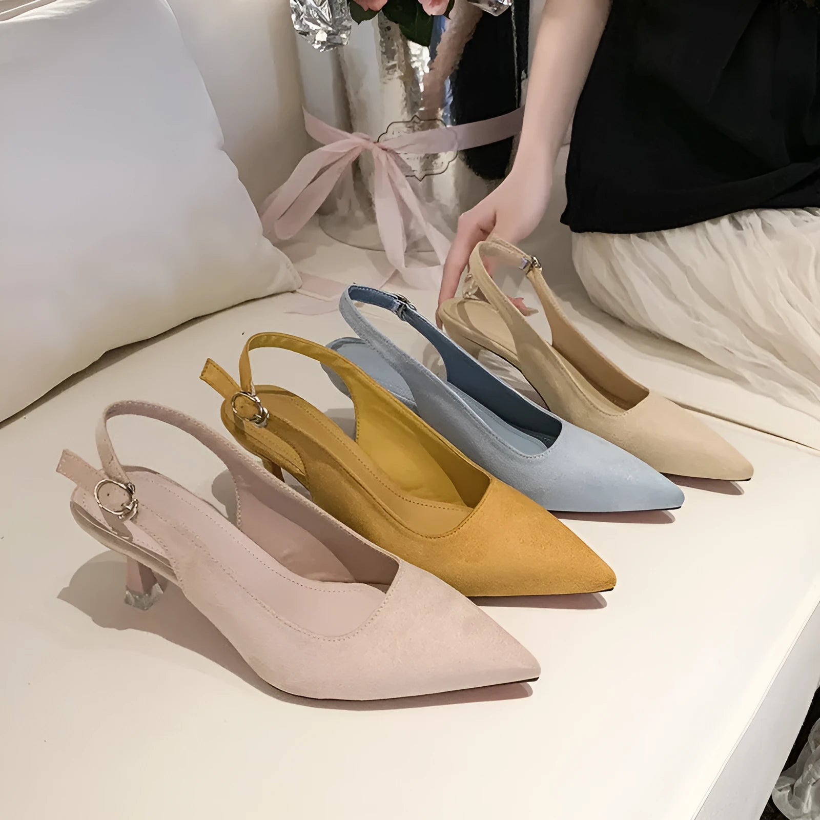 Women's apricot suede pointed-toe stiletto high heel shoe with a rubber sole