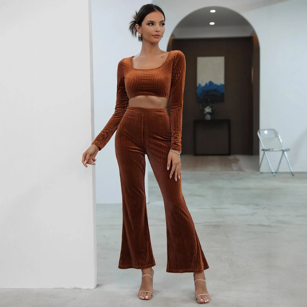 Caramel coloured long sleeve sweater and trousers casual set laid flat.